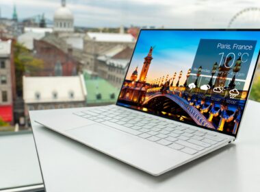laptop on white table